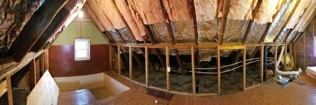 Redoing a drafty, century-old attic was a little out of my league, so we contracted out the job and I completed the finishes.