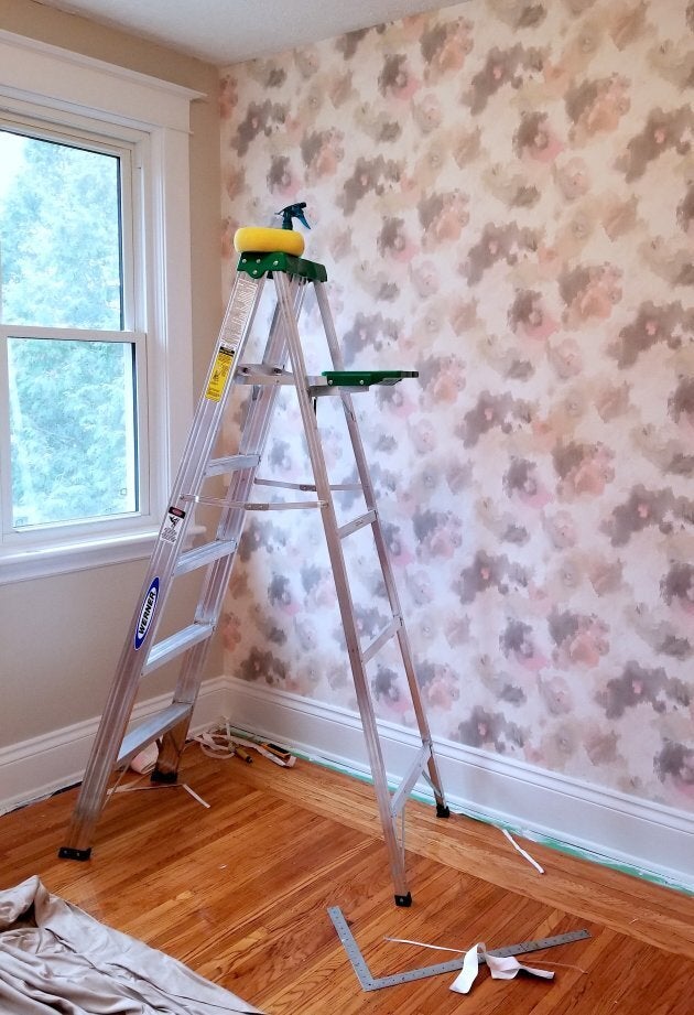 I turned a spare bedroom into a nursery — it was my first time hanging wallpaper.