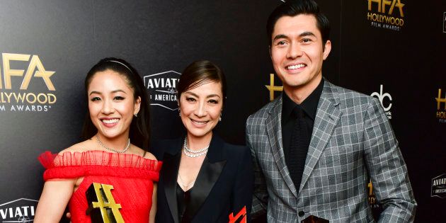 Constance Wu, Michelle Yeoh, and Henry Golding, recipients of the Hollywood Breakout Ensemble Award for 'Crazy Rich Asians,' pose at the 2018 Hollywood Film Awards, in Beverly Hills, California.