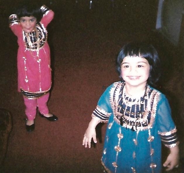 From left to right, Romana Kassam and her twin sister Shezin Kassam are dressed and ready to celebrate Khushali in 1986.