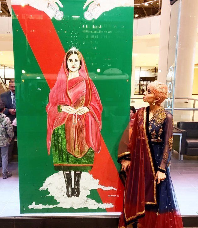 Romana Kassam standing next to her art work outside the Toronto Metro Convention Centre on Khushali on Dec. 13, 2018.