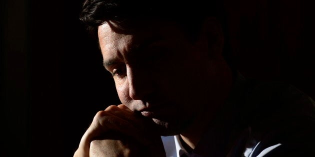 Prime Minister Justin Trudeau listens to a question as takes part in a year-end interview with The Canadian Press on Parliament Hill in Ottawa on Dec. 14, 2018.