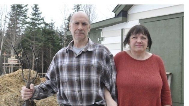 Gerard and Cara Aucoin pose on the Aucoin Family Farm in Kippens , N.L.