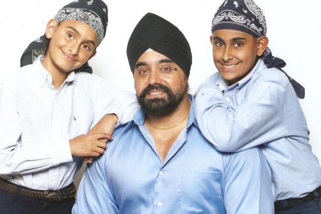 Suminder Singh is shown in a family photo with sons Jodhan (left) and Jeevan (right).