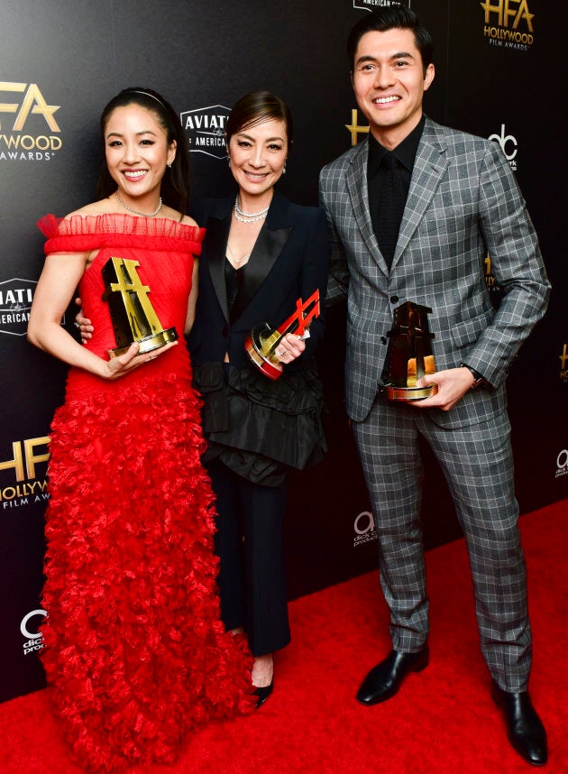 From left to right: Constance Wu, Michelle Yeoh, and Henry Golding, recipients of the Hollywood Breakout Ensemble Award for "Crazy Rich Asians."