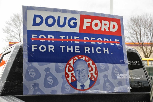 Protestors gathered at Doug Ford's company Deco Labels and Tags in Toronto on Nov. 17, 2018. Protestors gathered to demonstrate opposition to the Ford government's proposed cuts to social assistance, job protections, the minimum wage, healthcare, education, environmental safeguards, Ontario Works and to the Ontario Disability Support Program.