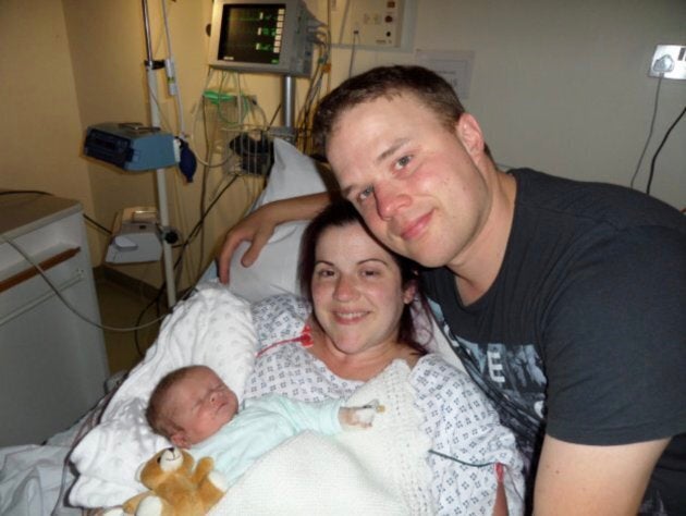 Rob Crussell, with his wife Kate, and son Theo. Theo died shortly after he was born.