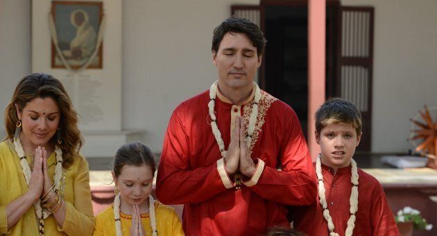 From left to right: Sophie Gregoire Trudeau, daughter Ella-Grace, Canadian Prime Minister Justin Trudeau and his son Xavier visit Gandhi Ashram in Ahmedabad on February 19, 2018.