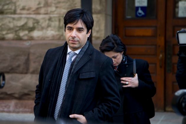 Jian Ghomeshi walks in front of his lawyer Marie Henein outside of a Toronto courthouse in March, 2016.