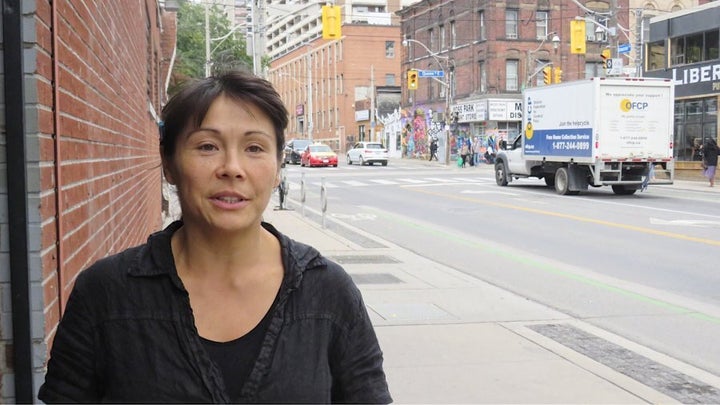 Jen Ko, a site co-ordinator, is skeptical of encroaching development in the Moss Park area.
