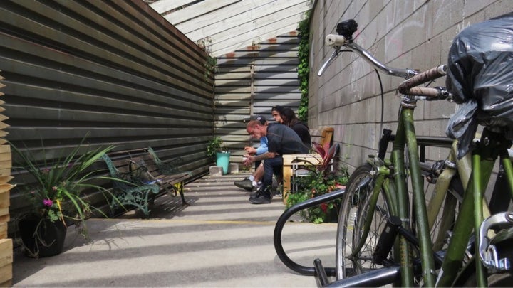 People hanging out on the site's back patio.