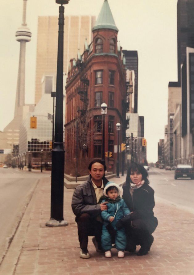 Catherine Pan and her parents pose in Toronto.
