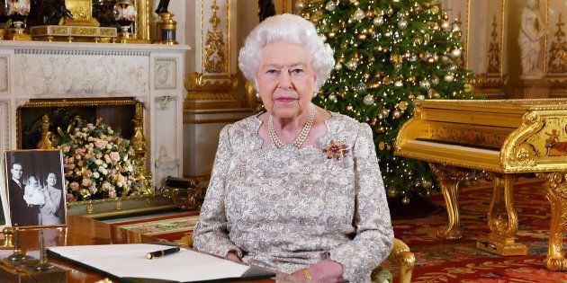 Britain's Queen Elizabeth poses, after recording her annual Christmas Day message in the White Drawing Room of Buckingham Palace.