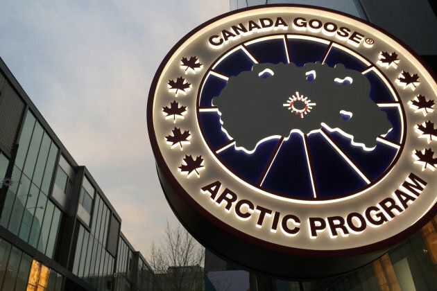 A Canada Goose sign is pictured at its newly opened flagship store in the Sanlitun area of Beijing.