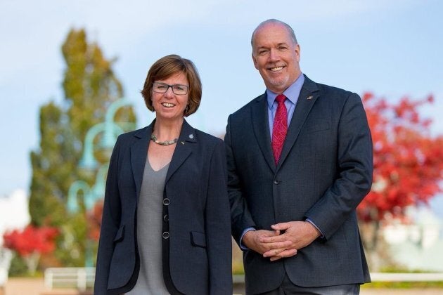 Sheila Malcolmson poses with B.C. Premier John Horgan in a photo posted to Malcomson's Facebook page.