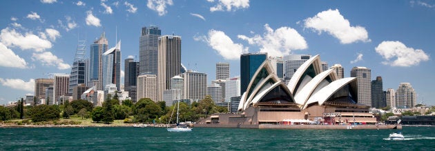 The Sydney Opera House with the Sydney, Australia, skyline in the background.