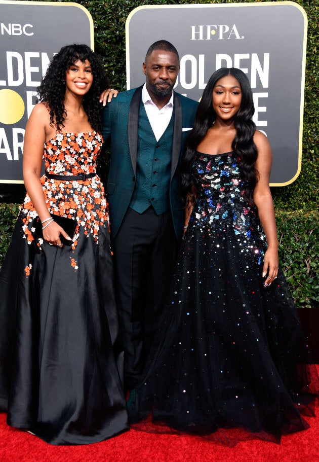 What a family portrait! Sabrina Dhowre, Idris Elba, and Isan Elba attend the 76th Annual Golden Globe Awards in LA on Jan. 6, 2019.