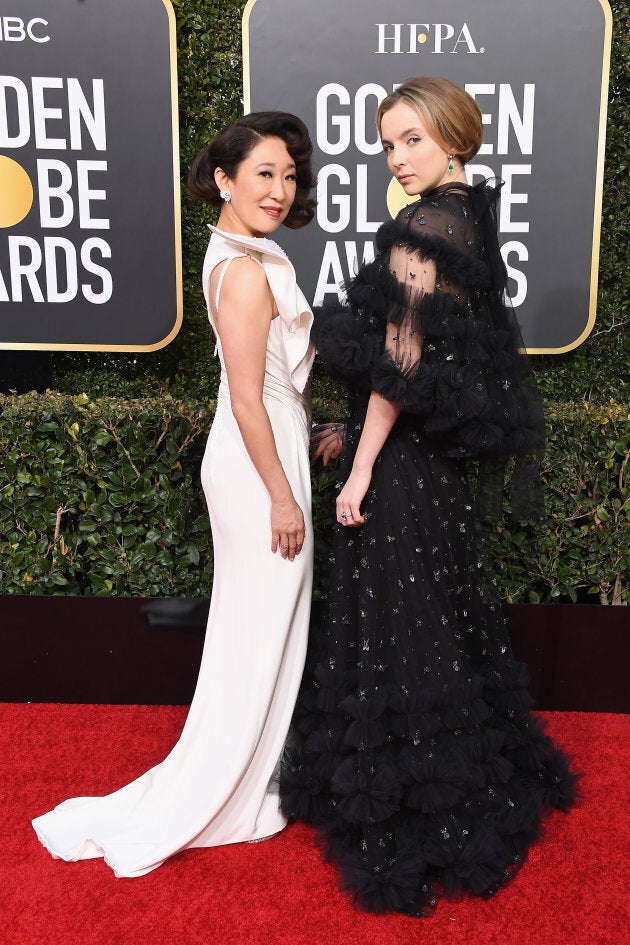 Sandra Oh and Jodie Comer on the Golden Globes red carpet.