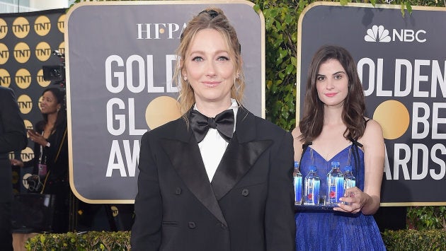 Judy Greer in front of international folk here Fiji girl.