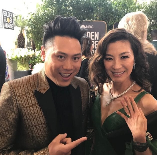 Director Jon M. Chu and Michelle Yeoh at the Golden Globes.