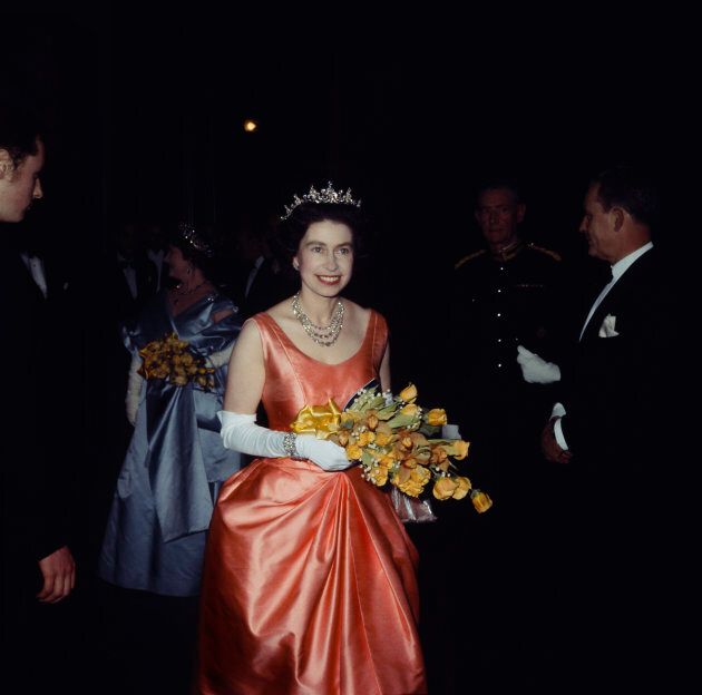 Queen Elizabeth II at a performance at the Royal Academy of Dramatic Art in London in November 1964.