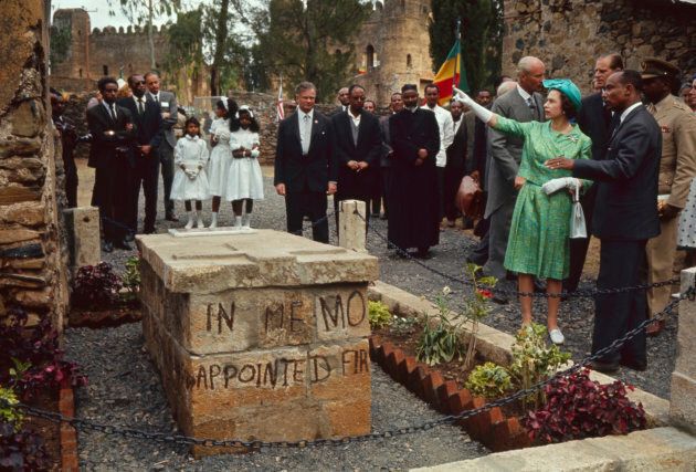 Queen Elizabeth II and Prince Philip (background, third right) tours Fasil Ghebbi, Gondar, Ethiopia, on Feb. 6, 1965.
