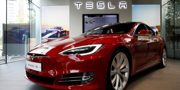 A Tesla Model S electric car at a dealership in Seoul, South Korea, July 6, 2017. Canada is well behind a majority of its developed-world peers when it comes to adopting electric car technology, a new report says.