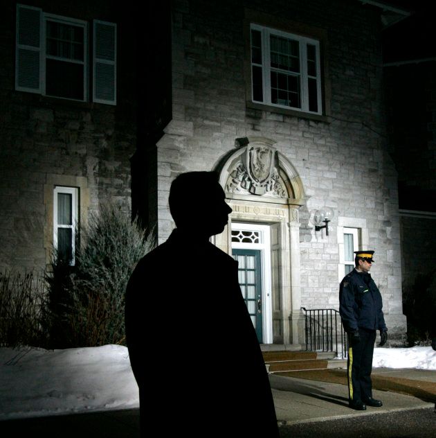 Royal Canadian Mounted Police stand watch outside of 24 Sussex Drive during the First Ministers meeting in Ottawa on Jan. 11, 2008