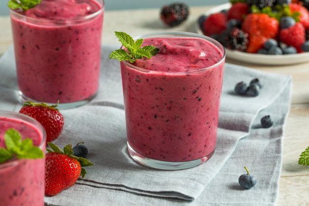 Healthy berry smoothie with blueberries, blackberries and strawberries