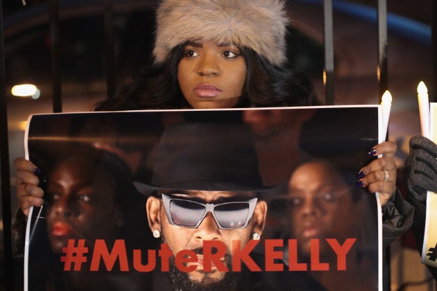 Demonstrators gather near R. Kelly's to call for a boycott of his music after allegations of sexual abuse against young girls were raised on "Surviving R. Kelly" on Jan. 9.
