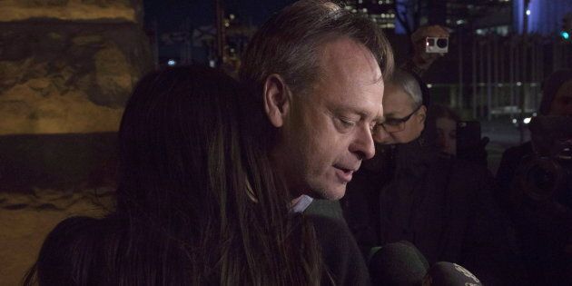 Marc Emery hugs his wife, Jodie, outside a Toronto court after being released on bail on March 10, 2017. He had pleaded guilty to trafficking cannabis, stemming from the opening of a Cannabis Culture boutique in Montreal.