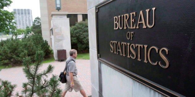 An employee makes their way to work at Statistics Canada, in Ottawa on July 21, 2010.