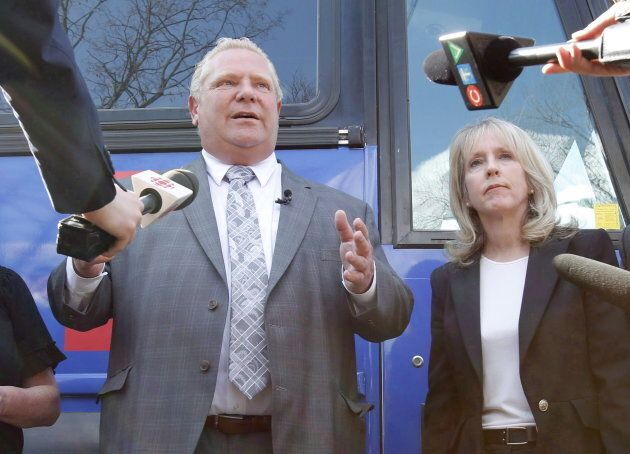 Premier Doug Ford and Minister of Training, Colleges and Universities Merrilee Fullerton speak to reporters a rally at Alice's Village Cafe as part of his Ontario provincial election campaign May 9, 2018.