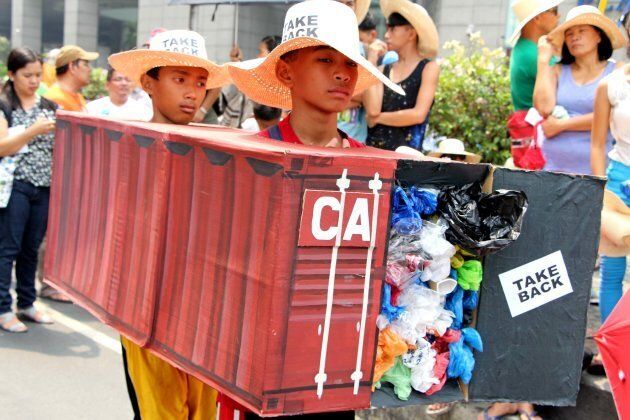 Protesters led by the EcoWaste Coalition and Piglas Kababaihan gather outside the Canadian Embassy in Makati City in May 2015.