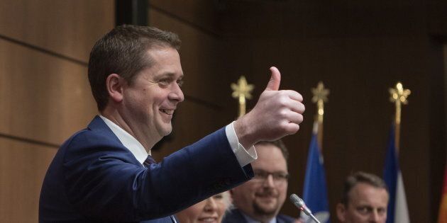 Conservative Leader Andrew Scheer gives the thumbs up as he addresses the Conservative caucus on Parliament Hill in Ottawa on Jan. 27, 2019.