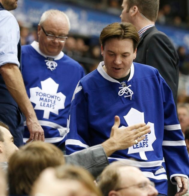 Mike Myers wears a Toronto Maple Leafs jersey to a Toronto vs. Boston hockey game at the Air Canada Centre on Oct. 25, 2014.