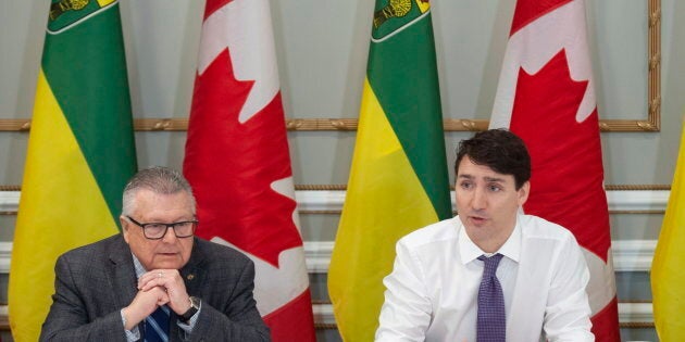 Prime Minister Justin Trudeau participates in a roundtable discussion with Public Safety Minister Ralph Goodale in Regina on Jan. 11, 2019.