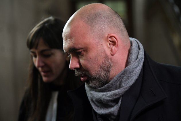 Nicolas R., one of two French policemen accused of raping a Canadian tourist in April 2014, arrives for a hearing at the Criminal Court in Paris on Jan. 14, 2019.