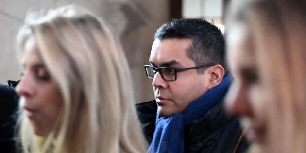 Antoine Q., one of two French policemen accused of raping a Canadian tourist in April 2014, arrives for a hearing at the Criminal Court in Paris on Jan.14, 2019.