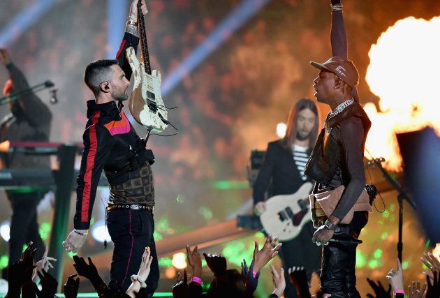 Adam Levine and Travis Scott perform during the Super Bowl LIII Halftime Show on Sunday.