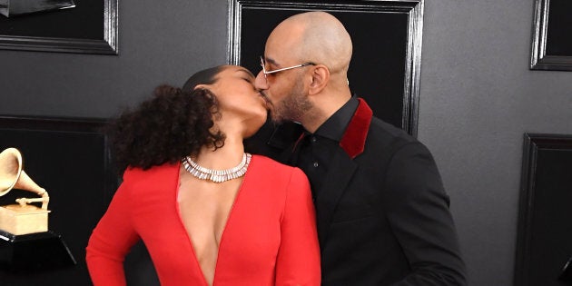 Grammys host Alicia Keys and her husband Swizz Beatz arrive at the ceremony on Sunday night.