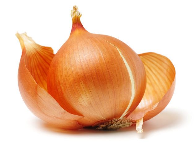 Fresh onion bulb isolated on white. With clipping path