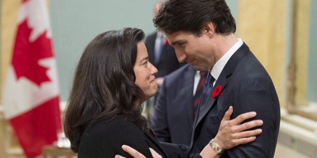 Prime Minister Justin Trudeau embraces former minister Jody Wilson-Raybould at a swearing-in ceremony in Ottawa in this Nov. 4, 2015 file photo.