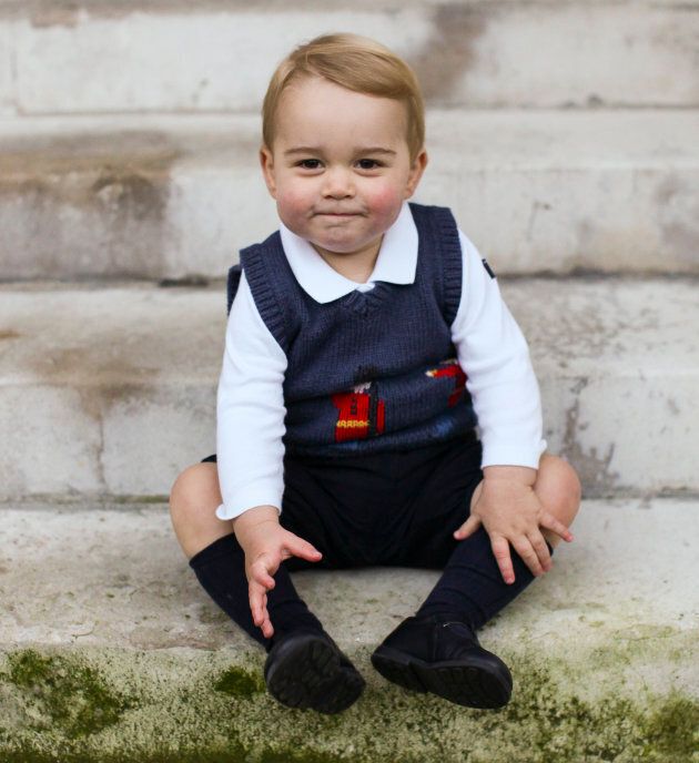 Prince George rocks the short pants and knee socks in a courtyard at Kensington Palace in late Nov. 2014 in London, England.