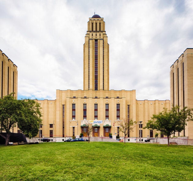 The Université de Montréal's main building with tower and lawn.