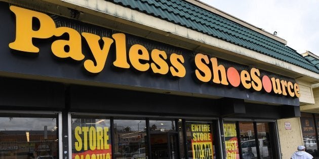 Customers leave a Payless Shoes store in Los Angeles on Feb. 17, 2019.