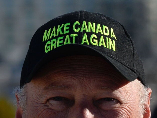 A protester wears a "Make Canada Great Again," hat as a convoy of angry Albertans and other westerners rolled up to Parliament Hill in Ottawa on Feb.19, 2019 to protest federal energy and environmental policies.