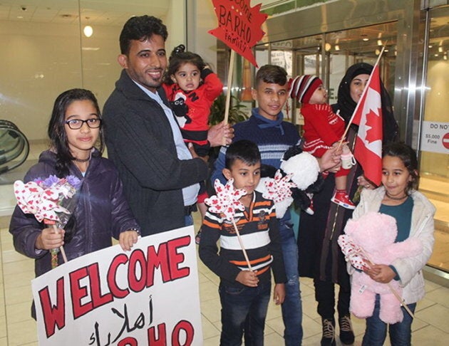 Members of the Barho family are shown upon arrival at the Halifax airport in a handout photo on Sept. 29, 2017.