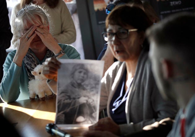 Sex abuse survivor Bernadette Howell (left) cries as she listens to Evelyn Korkamaz, another survivor, during a press conference of members of Ending Clergy Abuse in Rome, Feb. 22, 2019.