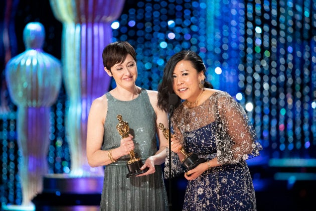 Becky Neiman-Cobb and Domee Shi accept their Oscar for Best Animated Short for "Bao."